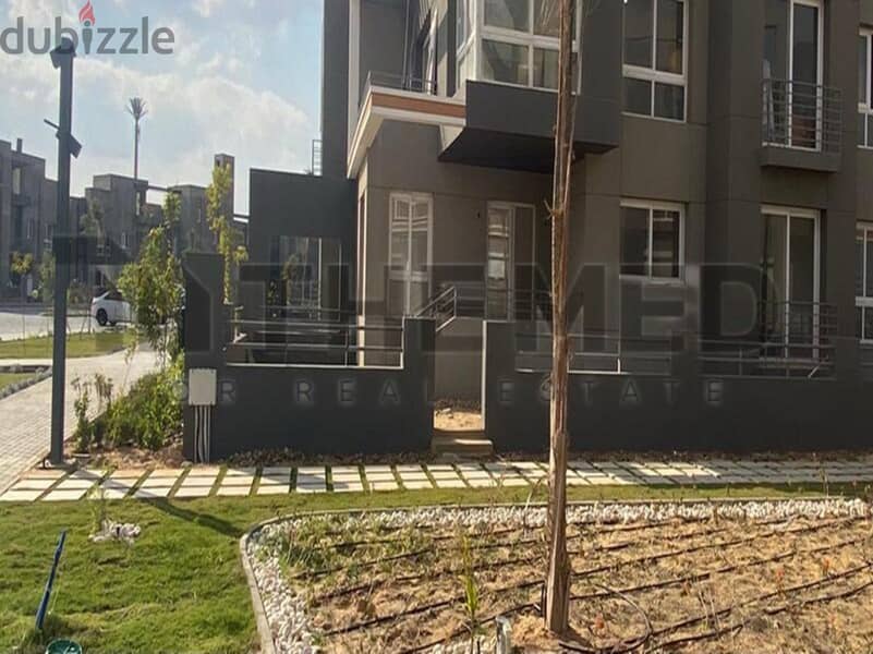 Apartment for sale, ground floor with garden, in Kayan Compound - 6th of October 8