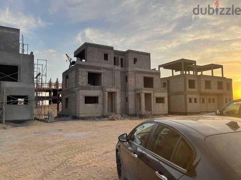 Twin house for sale with private pool in Naya West Compound, strategically located in front of Sphinx Airport and next to Sodic, Emaar, DeGioia and So 2