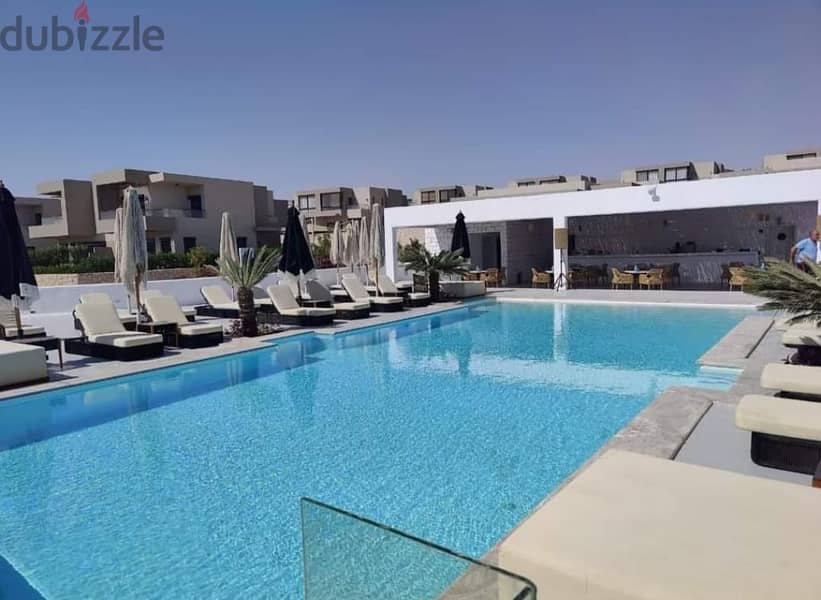 435 sqm villa for sale, super luxurious finishing, with air conditioners and kitchen, in Azha Village, North Coast 6