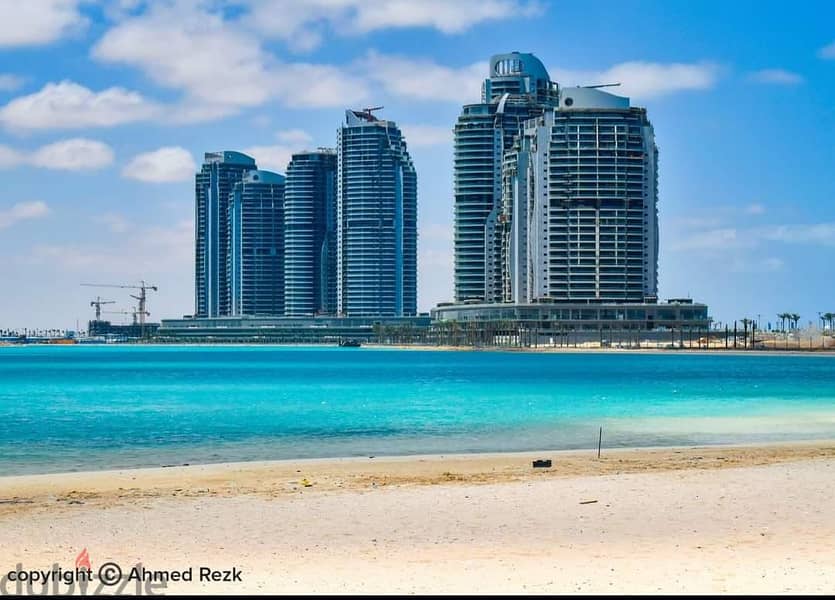 Apartment for sale directly on the sea in Al Alamein Towers, fully finished with air conditioners, 3 rooms, alamin toweres 1