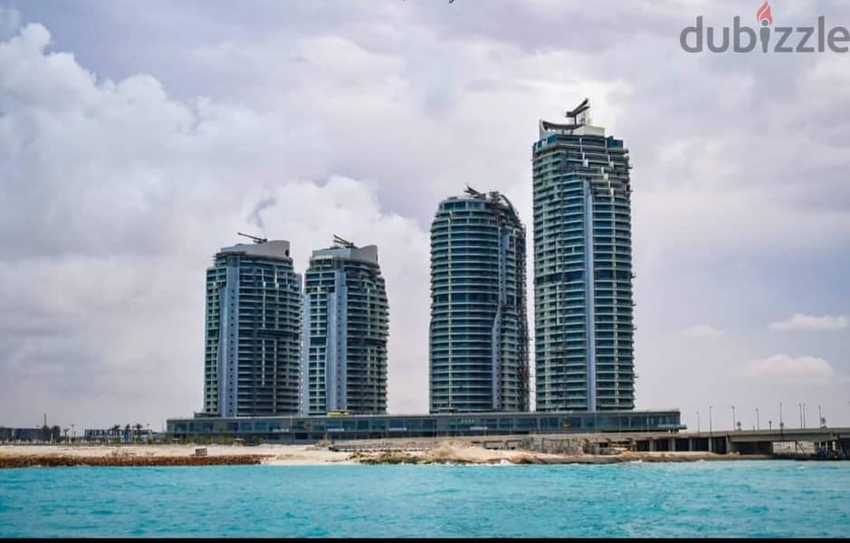 Apartment for sale directly on the sea in Al Alamein Towers, fully finished with air conditioners, 3 rooms, alamin toweres 4