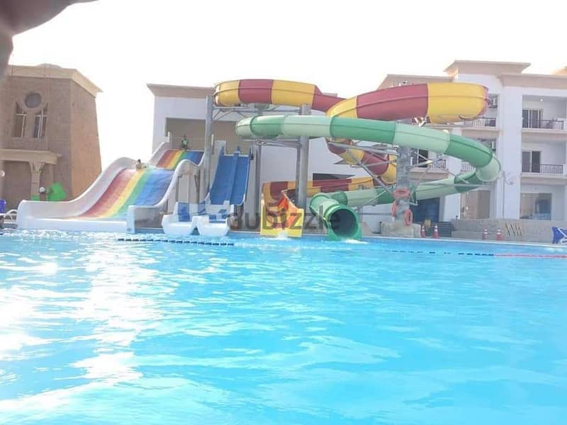 Offer a chalet (furnished and finished) 3 rooms + 2 bathrooms for sale in Ain Sokhna (own the best investment) and a share of your profits in the vill 20