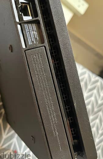 Sony PlayStation4 1TB Slim with 2 DualShock4 Wireless Controlers 2