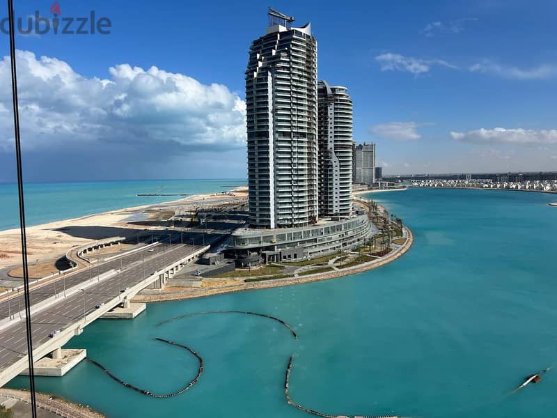 217 sqm double view apartment on the sea for sale in Al Alamein Towers, fully finished, 30% cash discount from City Edge Company. 2