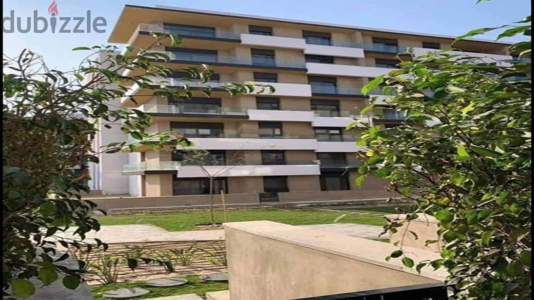 A 3-room apartment in Al Burouj Compound, with a view of green spaces, installments over 7 years 7