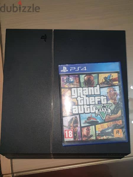 Playstation 4 used (بلايستيشن ٤), with two controllers and GTA V 3