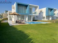 For sale, 120 sqm chalet, ready with finishes, first row on the sea in Fouka Bay, the largest tourist resort in Ras El Hekma, North Coast, Fouka Bay