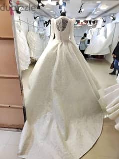 فستان زفاف بالطرحه 0