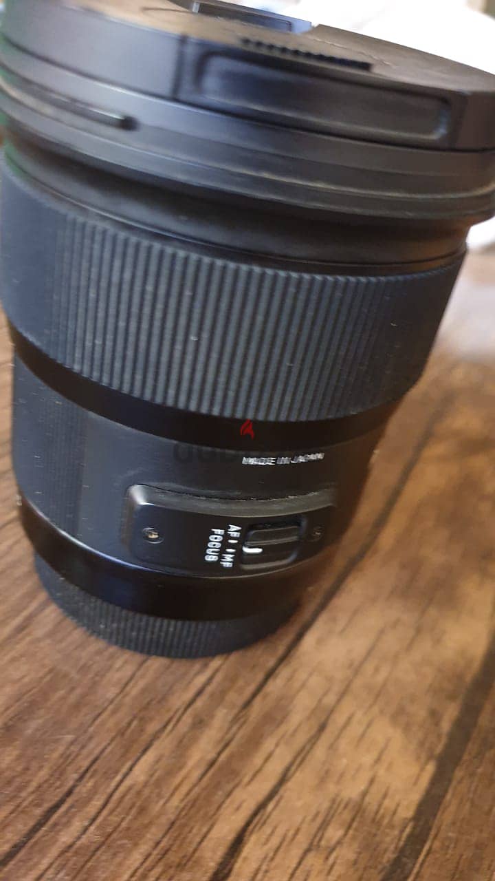 Sigma 24mm f/1.4 DG - عدسة سيجما لكاميرات نيكون 24 ملي 7