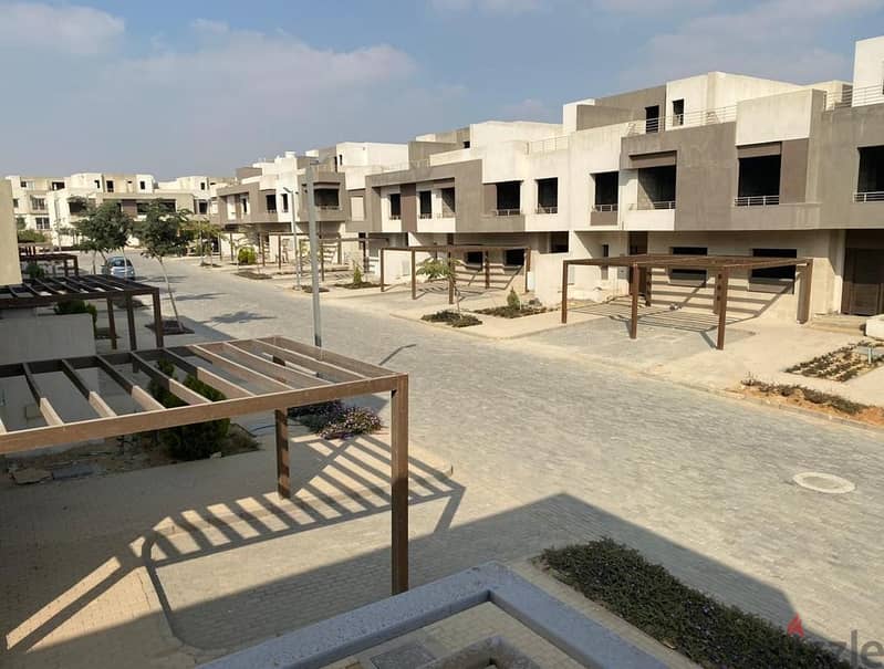 Townhouse for Sale with Prime location Open view to greenery in Palm Hills New Cairo with Down Payment and installments till 2032 2