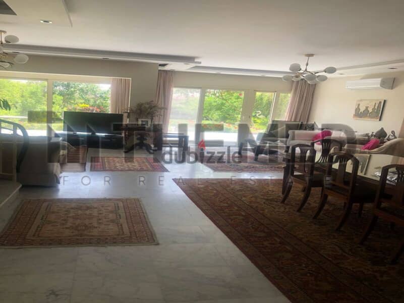 Twin house for sale, prime location on the golf course, in Rabwa Compound, Sheikh Zayed 4