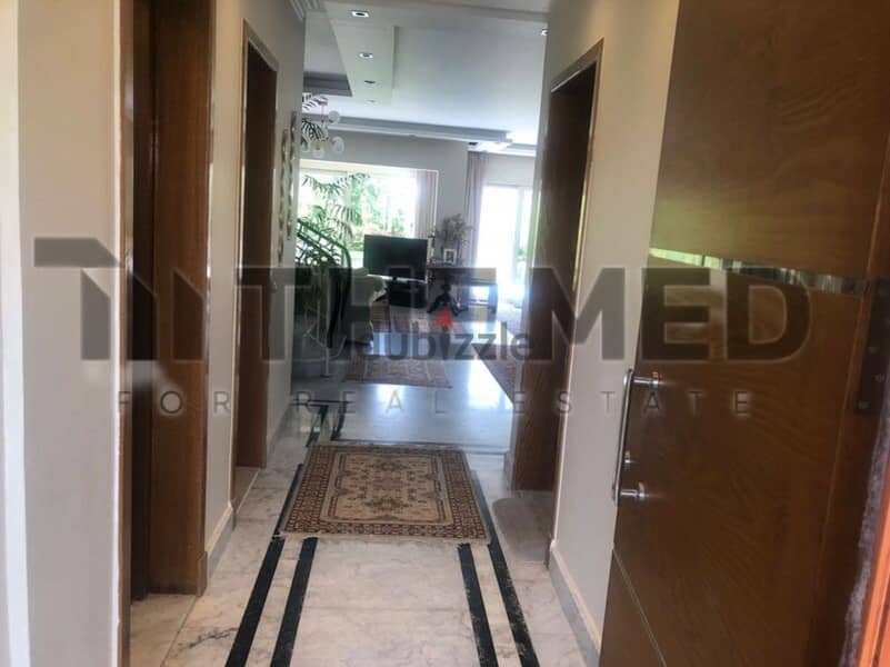 Twin house for sale, prime location on the golf course, in Rabwa Compound, Sheikh Zayed 8