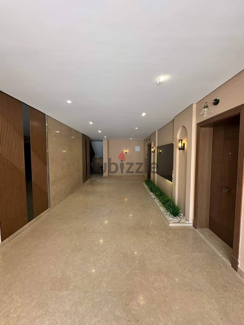 Fully finished apartment for sale at Village west , Sheikh zayed 3