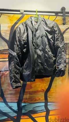 Motorcycle safety jacket (tourmaster draft air V4)