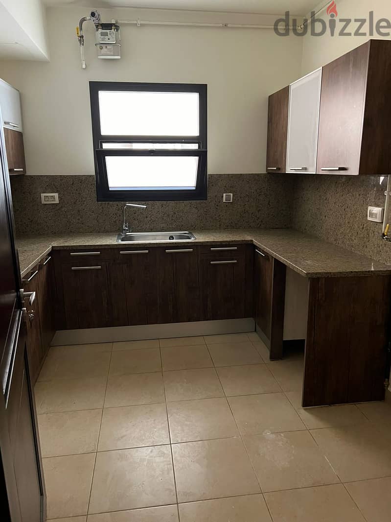 Apartment for rent in mivida with kitchen and AC'S - new cairo 2