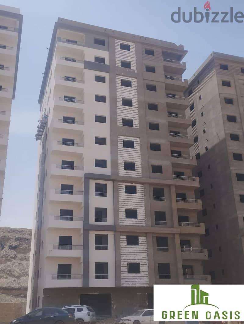 Received immediately at a snapshot price. . 130 sqm apartment for sale in installments in Nasr City in the Green OASIS Compound 5