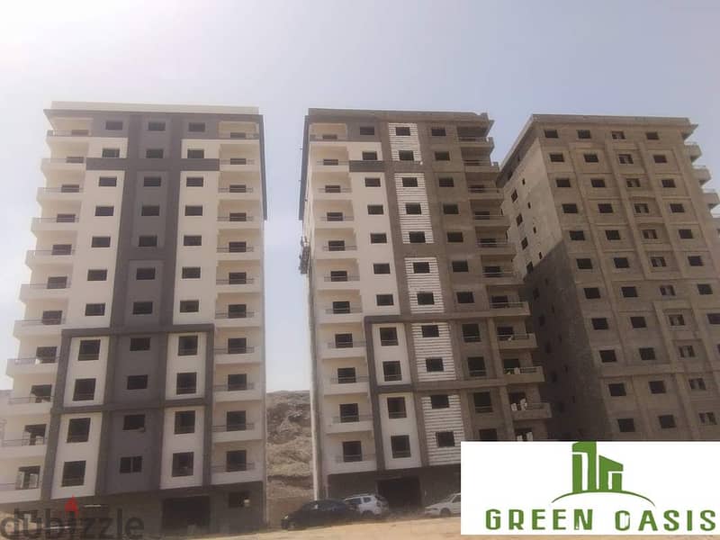 Received immediately at a snapshot price. . 130 sqm apartment for sale in installments in Nasr City in the Green OASIS Compound 7