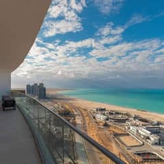 Apartment 154 meters immediate receipt in El Alamein Towers with an open view on Lake El Alamein (((fully finished + air conditioners)))