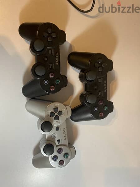 ps3 , 3 controllers,17 games 5