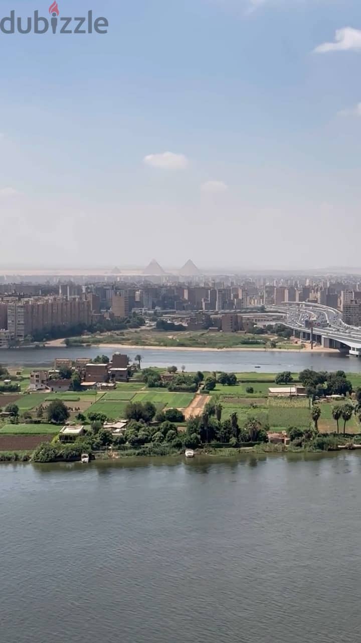 For sale, a hotel apartment directly overlooking the Nile, immediate receipt, fully finished, with a distinctive location (Service by Hilton) 4