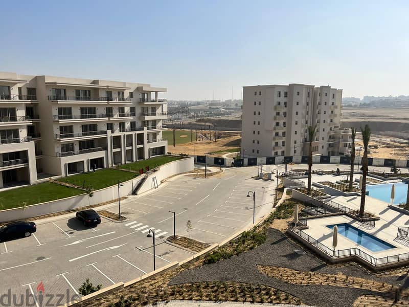 Fully Finished Ground Apartment for Sale in Uptown Cairo Golf Residence Very Prime Location Open View 1