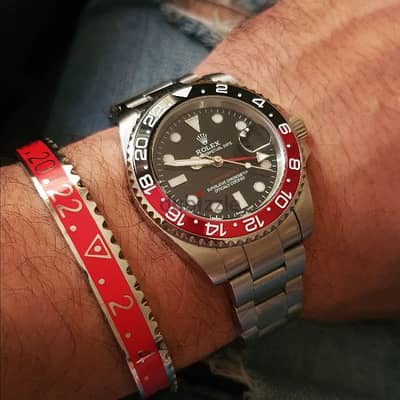 Rolex GMT Red Black bezel