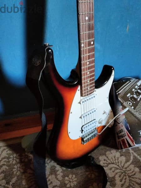 electric guitar with amp and belt 1