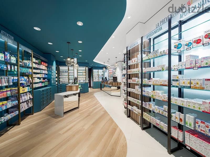 An exclusive pharmacy with a 20% discount in front of Al-Marasem Hospital and a medical building, serving the largest residential complex 5