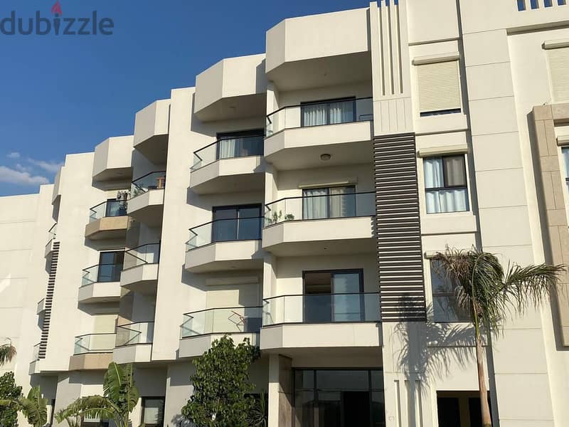 Immediately receive a fully finished hotel apartment with kitchen, managed by Concode International, in front of City Center Almaza, with a 10% down p 2