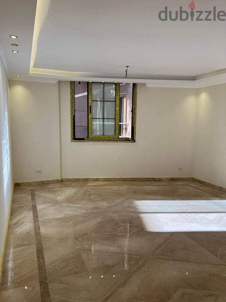 Immediately receive a fully finished hotel apartment with kitchen, managed by Concode International, in front of City Center Almaza, with a 10% down p 9