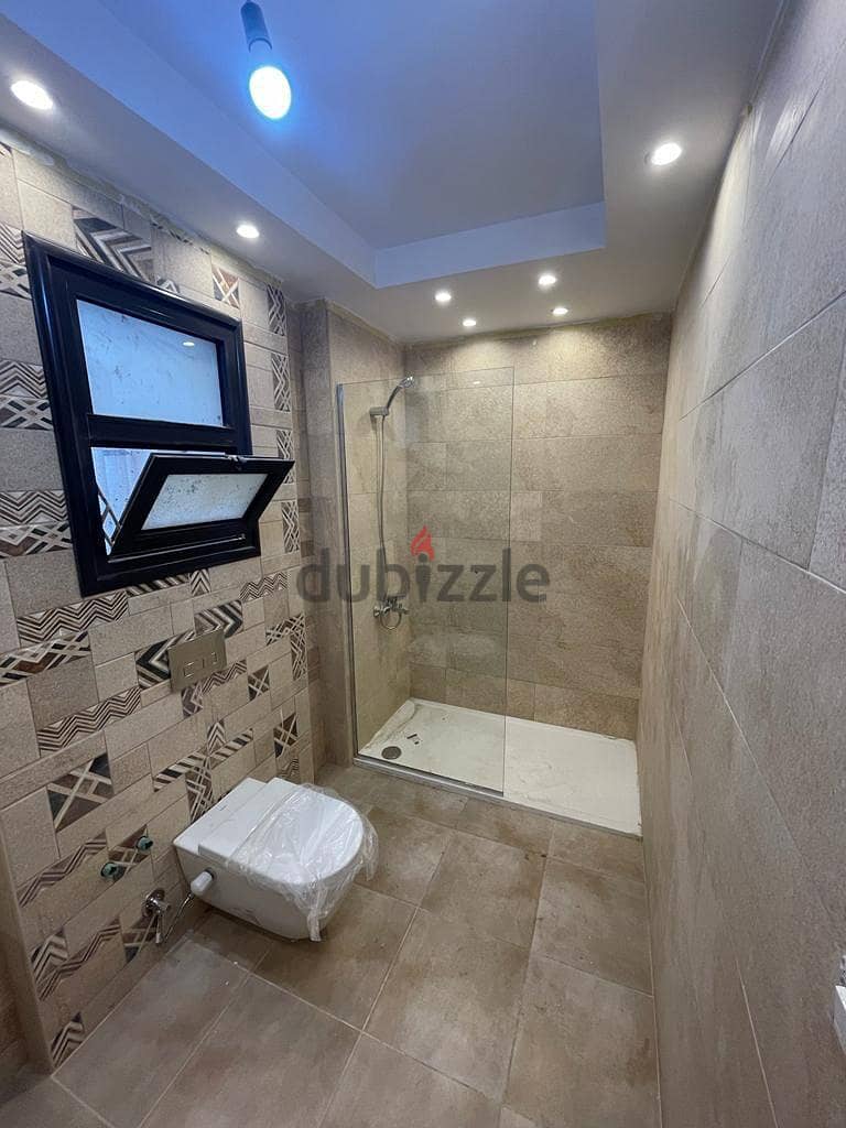 Immediately receive a fully finished hotel apartment with kitchen, managed by Concord, in front of City Center Almaza, with the lowest down payment an 6