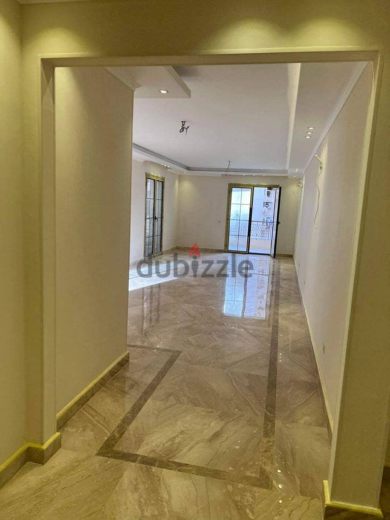 Immediately receive a fully finished hotel apartment with kitchen, managed by Concord, in front of City Center Almaza, with the lowest down payment an 10