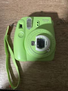 fujifilm instax mini 9 camera in lime green