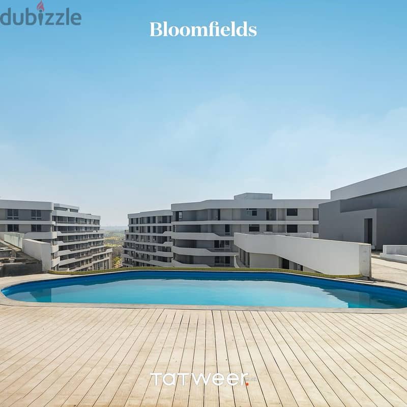 Receiving 6 months of a 128 sqm apartment on View Direct in Bloom Fields Compound, wall by wall, with the Administrative Capital, with a 20% down paym 16
