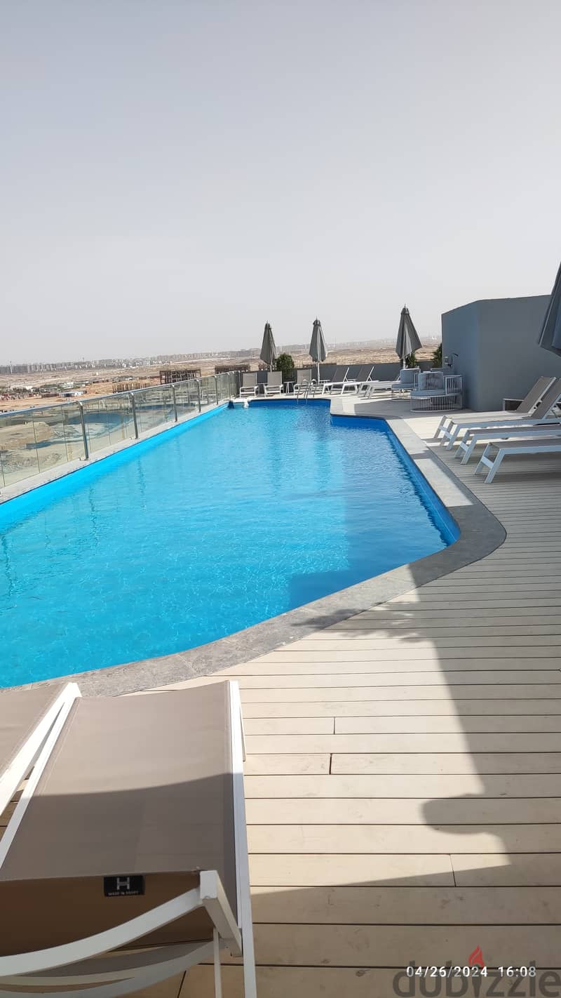 Receiving 6 months of a 128 sqm apartment on View Direct in Bloom Fields Compound, wall by wall, with the Administrative Capital, with a 20% down paym 17