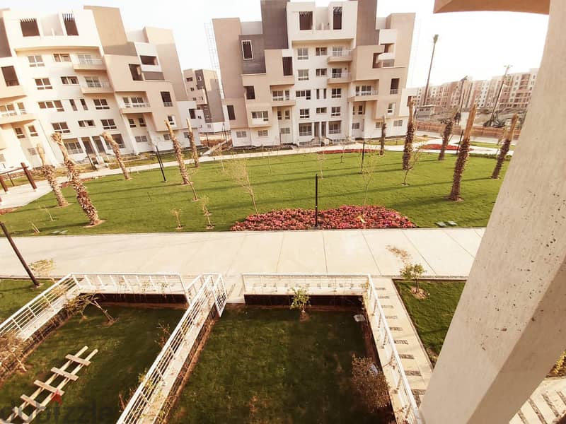 Ground floor apartment with a private garden for sale in Madinaty, in one of the most upscale and beautiful phases of Madinaty, in B8. 1