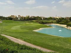 The best and most distinguished villa with a panoramic view of international golf and separate lakes, fully paid, 700 sqm.