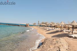 Chalet for sale in a compound with a private sandy beach in the heart of Hurghada