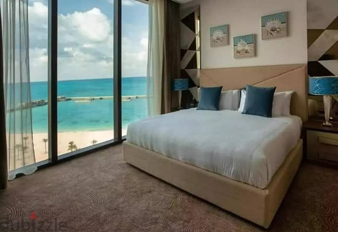 Hotel apartment to be received for months in El Alamein Towers with elegant finishing imaginative view on the central lagoon at opening prices 1