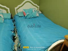غرفه نوم لأطفال سريرين ودولاب