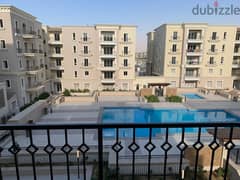 semi furnished Apartment 2rooms for rent in Mivida Boulevard view pool