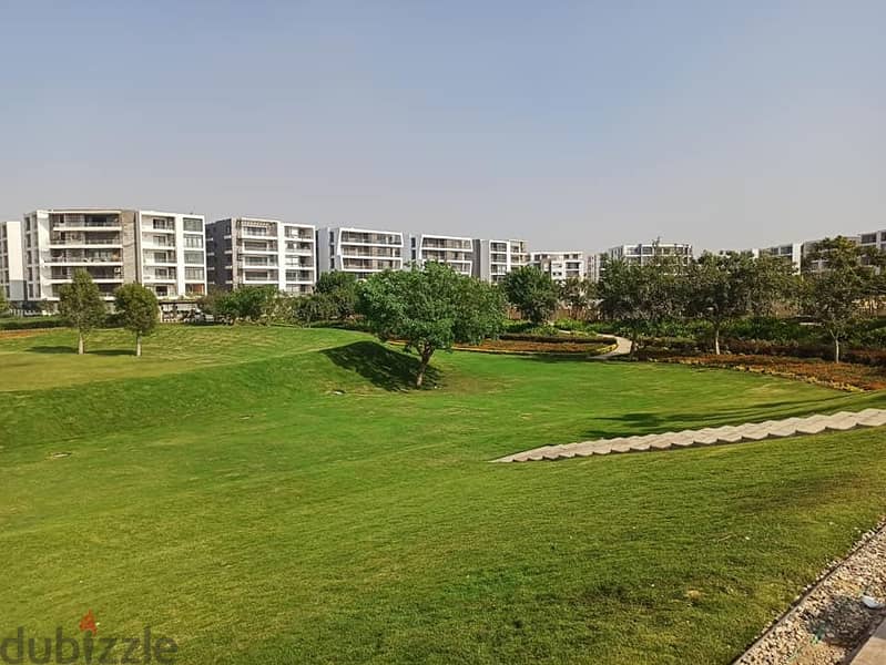 Apartment for sale, ground floor with garden, in Taj City, New Cairo 2