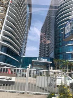 430 sqm apartment in Nile Pearl Towers for sale, immediate receipt, first row, under Hilton management, fully finished + adaptations