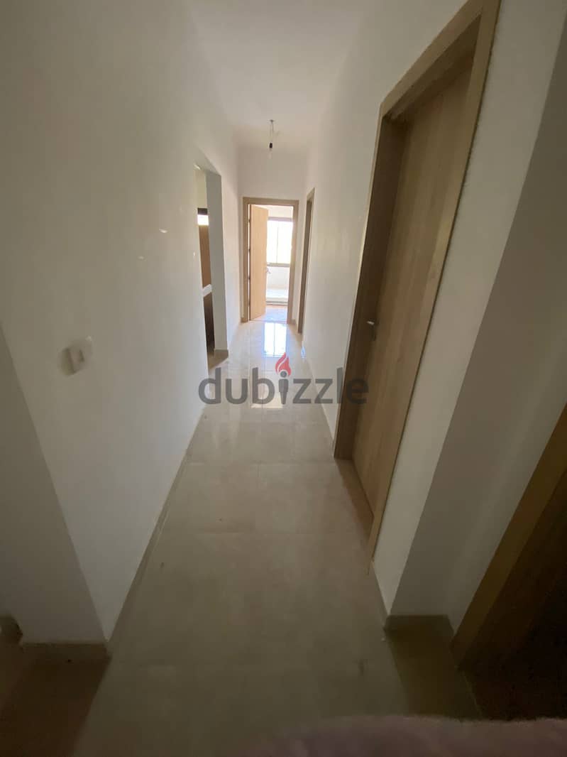 Apartment ground floor with kitchen & ACs for rent in fifth square almarasem compound New Cairo fifth settlement 3
