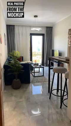 Furnished and finished chalet with a down payment of 463 thousand, two rooms, view on the swimming pool, for sale in Sidi Abdel Rahman, North Coast 0