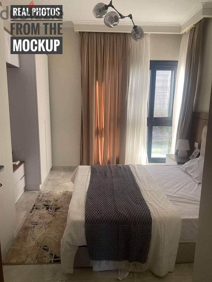 Furnished and finished chalet with a down payment of 463 thousand, two rooms, view on the swimming pool, for sale in Sidi Abdel Rahman, North Coast 1