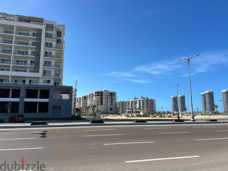 Corner Chalet Panoramic view El Alamein Towers, The Gate Tower and Marina 7 in the most distinguished building in Mazarine 1