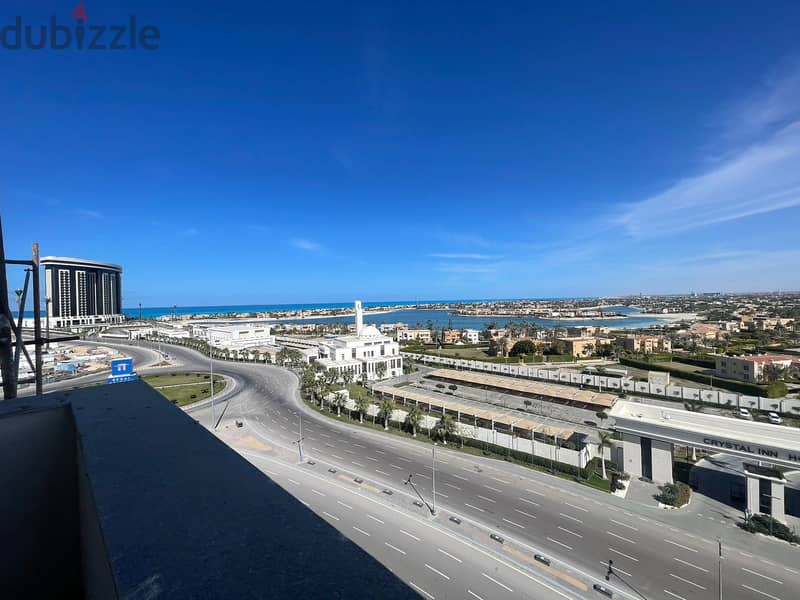 Corner Chalet Panoramic view El Alamein Towers, The Gate Tower and Marina 7 in the most distinguished building in Mazarine 6