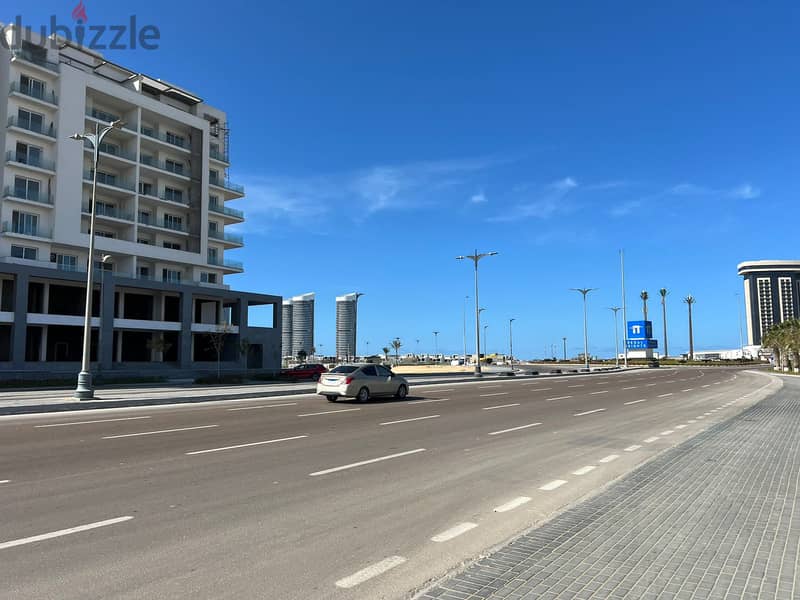 Corner Chalet Panoramic view El Alamein Towers, The Gate Tower and Marina 7 in the most distinguished building in Mazarine 8