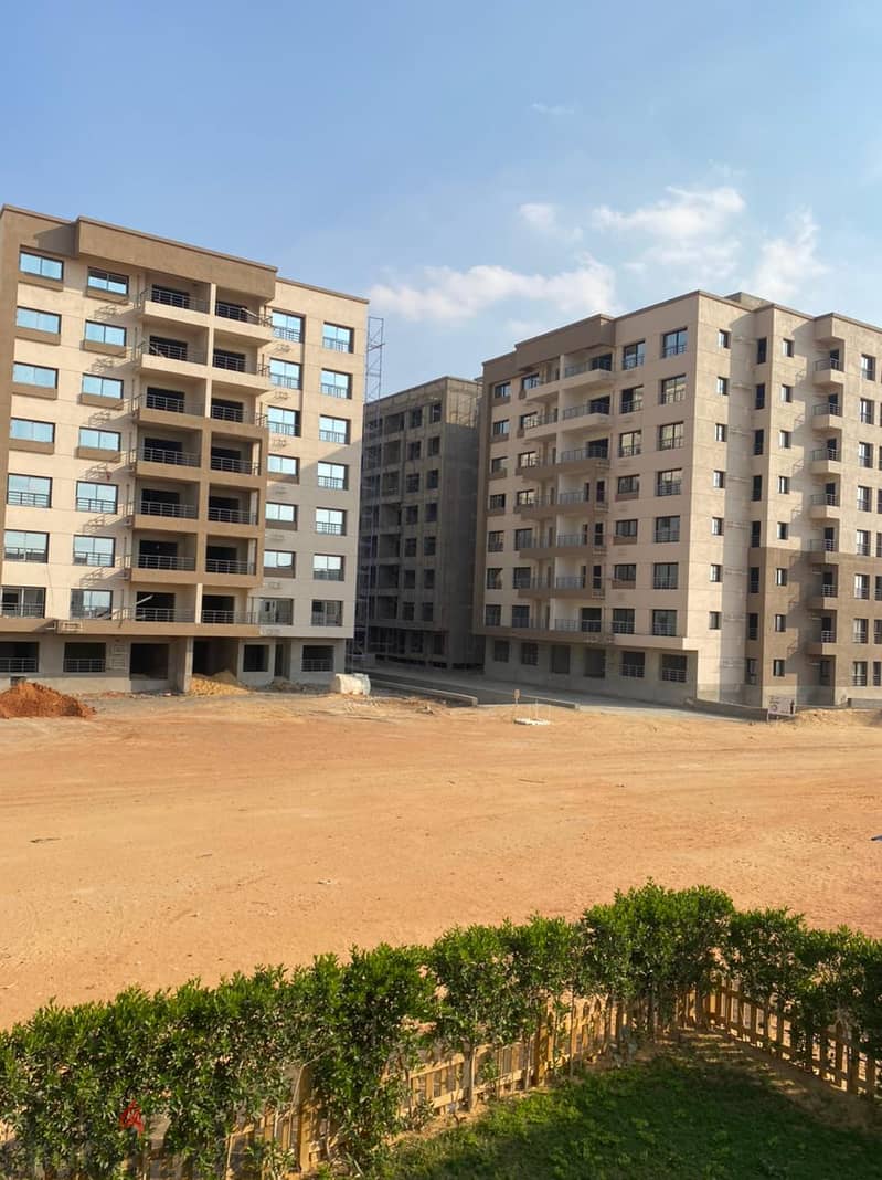 Pay 299 thousand EGP and live in a finished apartment inside a compound and pay the rest in installments at your convenience, for sale in the capital, 4